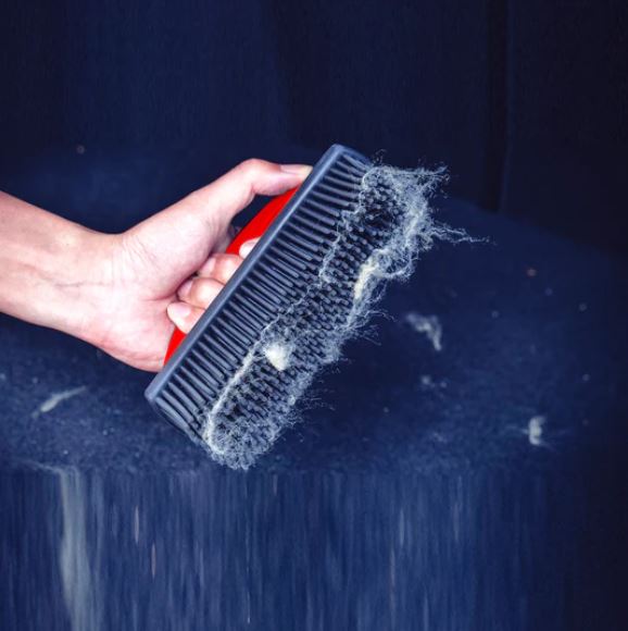 Rubber hair remover outlet brush